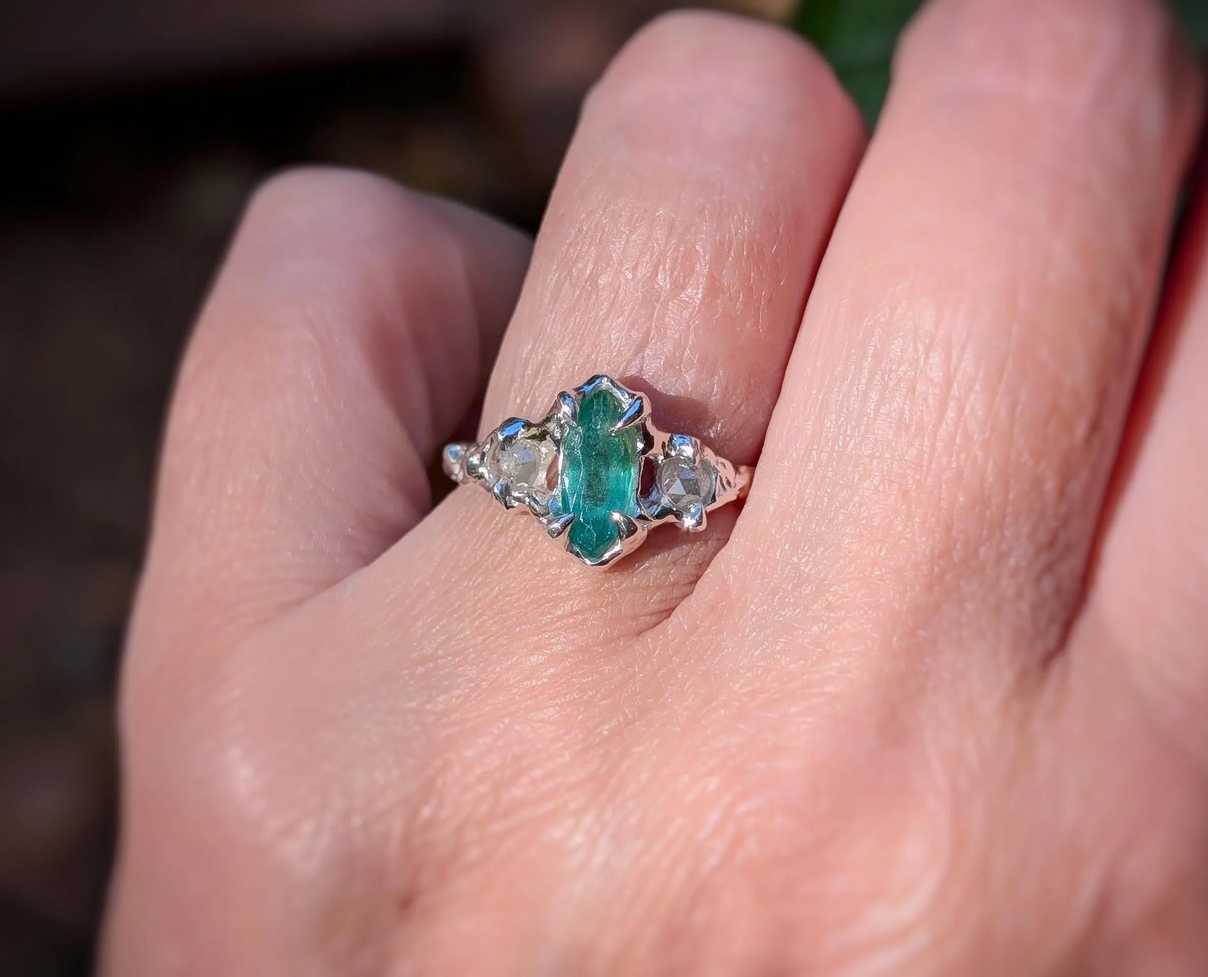 Silver Emerald and diamond engagement ring